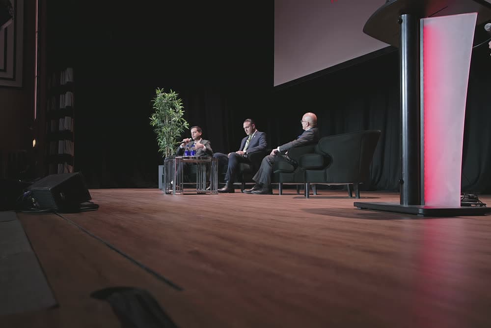 The stage at The Carlu with the lit TBKO podium, Toronto Business Kick-Off 2026